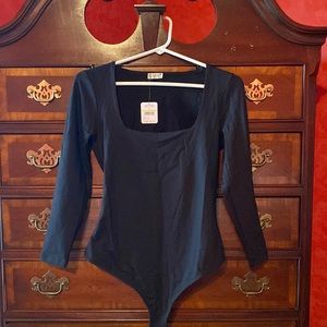 Free People intimates. Black bodysuit. Super soft nylonish, stretchy material.